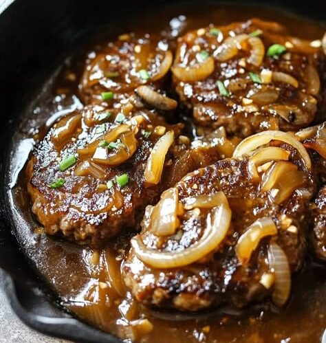 Delicious beef patties with onion sauce