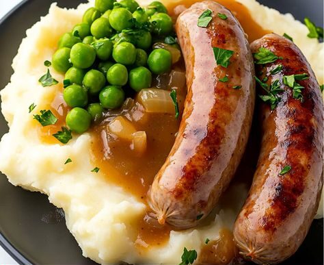 Bangers mash & peas with onion gravy
